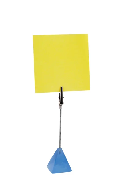 Papel amarelo em suporte de papel usando por para memorando — Fotografia de Stock