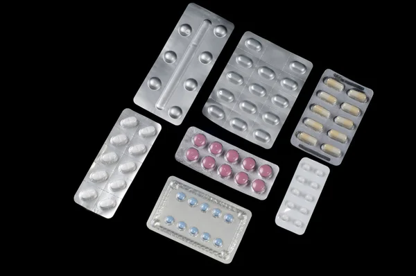 Вариации упаковки таблеток — стоковое фото