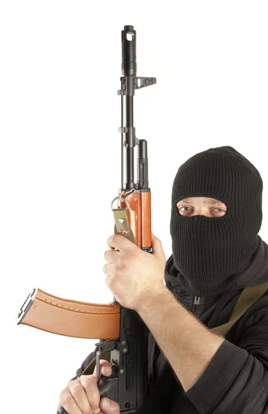 Man in mask with gun — Stock Photo, Image