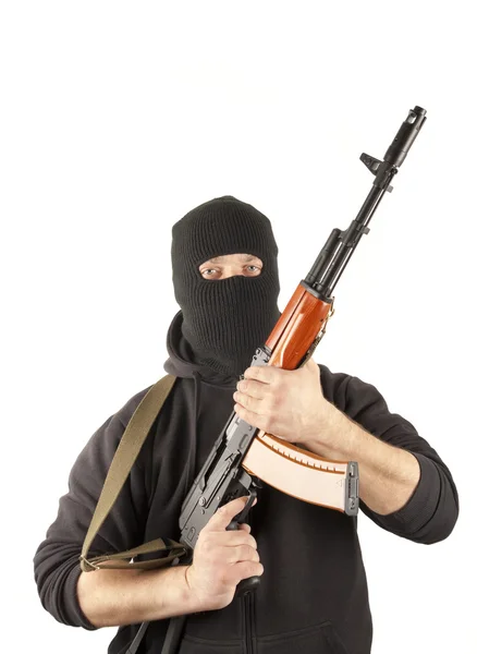 Man in mask with gun — Stock Photo, Image