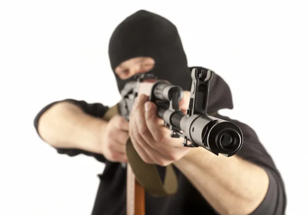 Mann mit Maske und Waffe — Stockfoto