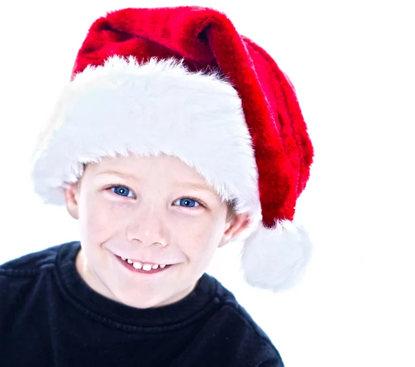 Boy in santa hat Royalty Free Stock Images