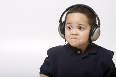 Sad boy with headphones clipart