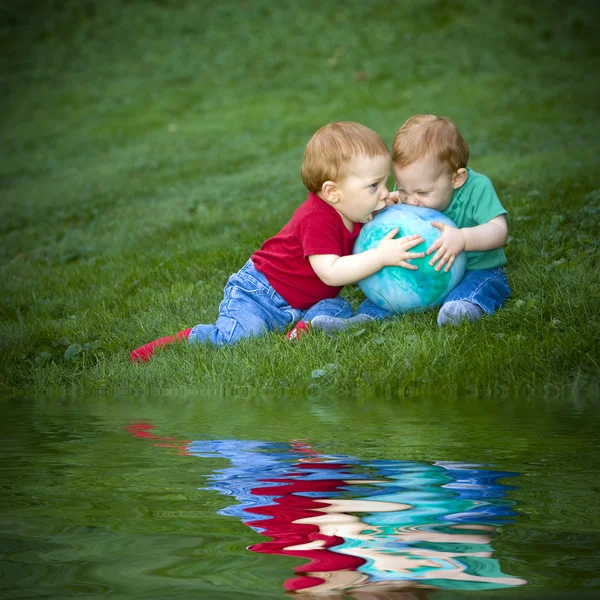 Baby boys on grass — Stock Photo, Image