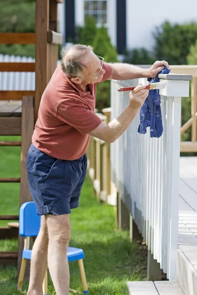 Man painting fence — Stock Photo, Image