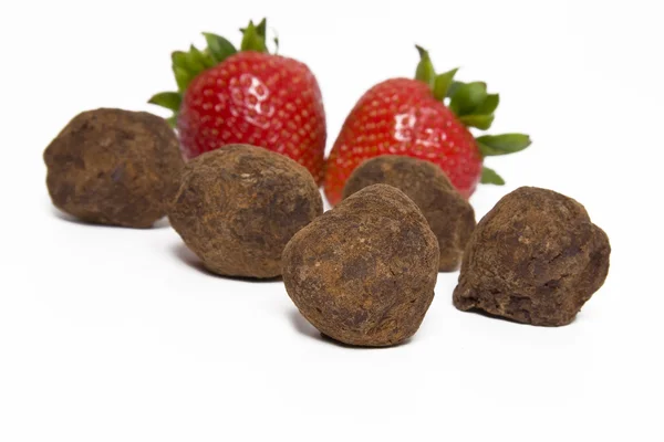 stock image Strawberries and chocolate truffles