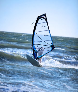 Lone windsurfer clipart