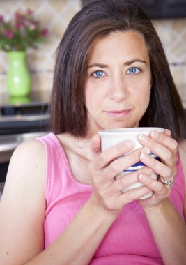 Woman drinking coffee clipart