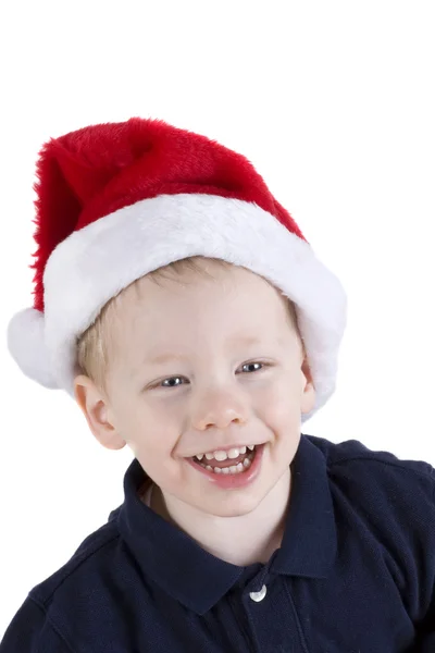 Boy in santa hat Stock Image
