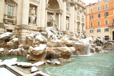 The Trevi Fountain covered by snow clipart