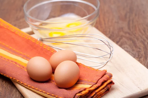 Wire whisk and eggs — Stock Photo, Image