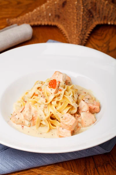 Fettuccine with salmon — Stock Photo, Image