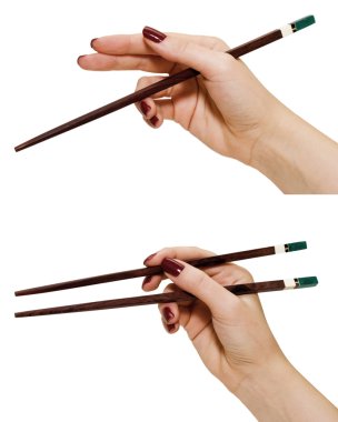 Chopsticks in a hand clipart