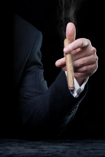 Person holding a cigar — Stock Photo, Image