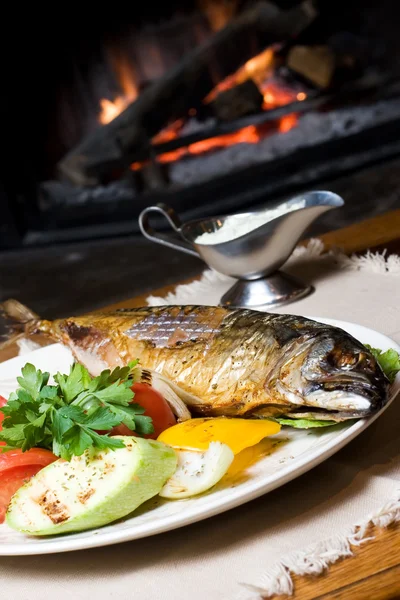 Fish dinner on a plate — Stock Photo, Image