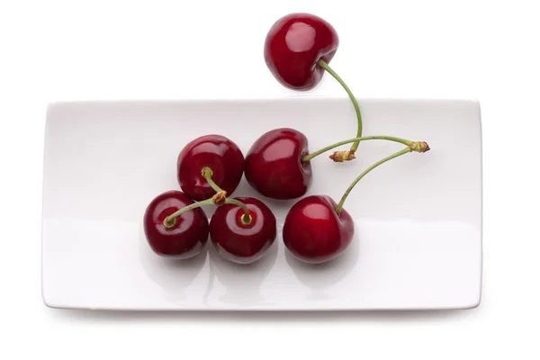 Cherry on a plate — Stock Photo, Image