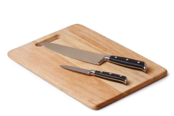 Настольный нож и доска для резки — стоковое фото