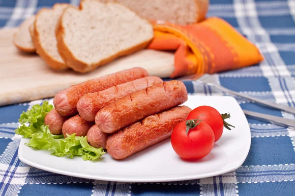 Plate with hot sausages — Stock Photo, Image