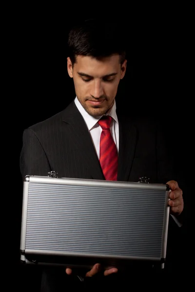 Man open suitcase — Stock Photo, Image