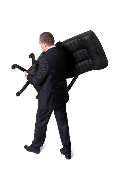 Bir sandalye tutan adam — Stok fotoğraf