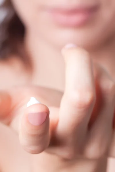 Cream on the women hand. — Stock Photo, Image
