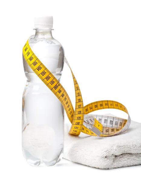 Bottle of water,towel and tape measure — Stock Photo, Image