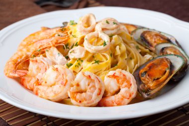 Fettuccine and seafood clipart