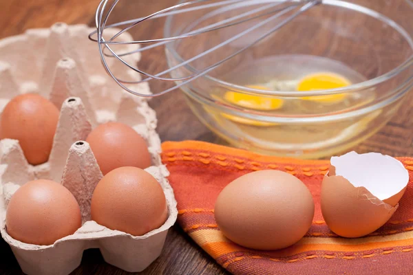 Wire whisk and eggs — Stock Photo, Image