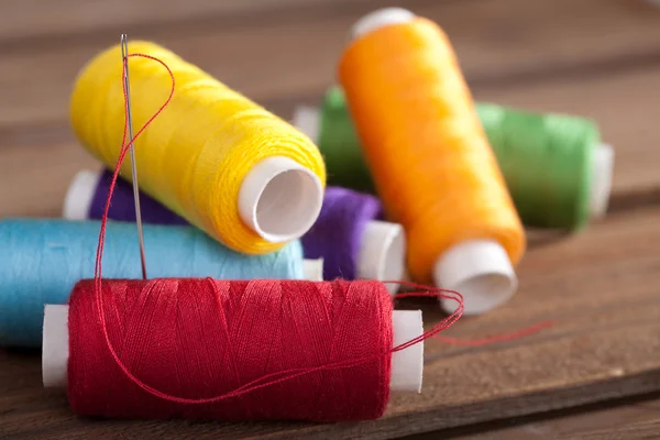 Coloured bobbins of thread — Stock Photo, Image
