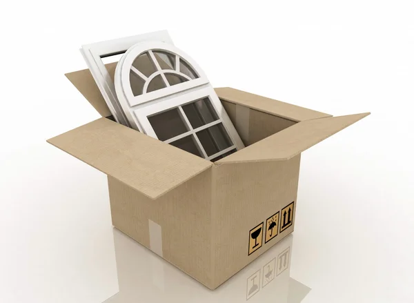 Пластиковые окна в картонной коробке — стоковое фото