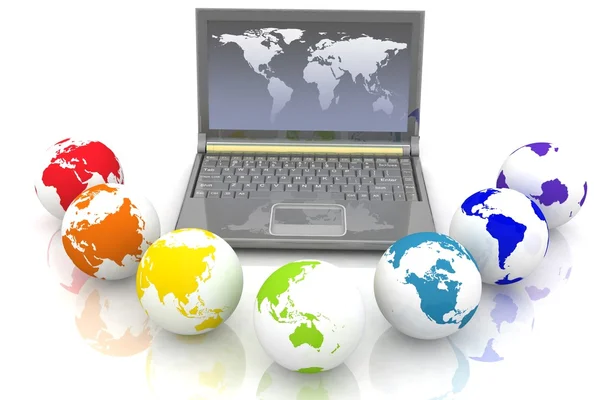 Laptop and globes of all colors of rainbow — Stock Photo, Image