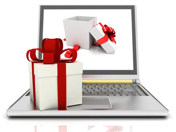 Laptop i prezenty — Zdjęcie stockowe