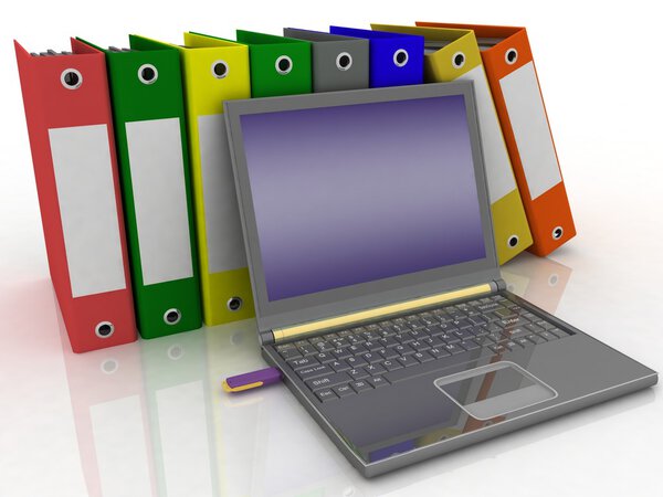 Colorful folders next to a modern laptop