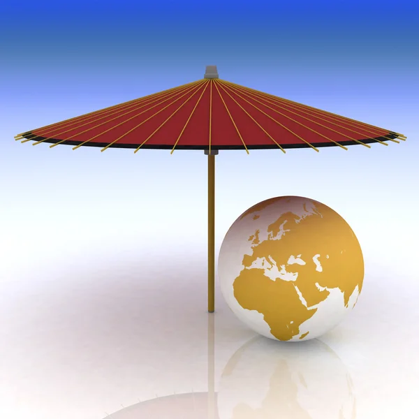 Globus unter einem Sonnenschirm am Strand — Stockfoto