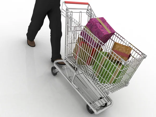 The man rolls the store cart with gifts — Stock Photo, Image