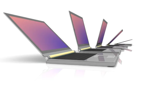 Lineup de laptops ao lado uns dos outros — Fotografia de Stock