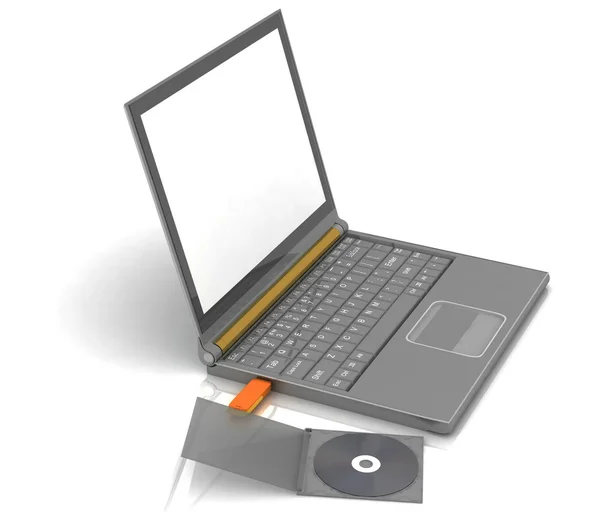 Cd ligt naast een notebook waarin de ingevoegde flash drive — Stockfoto