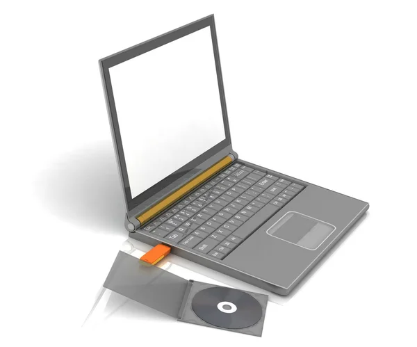 CD fica ao lado de um notebook no qual a unidade flash inserida — Fotografia de Stock