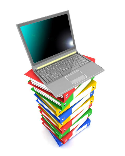 Laptop on stack of folders