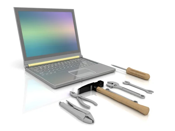 El portátil con el conjunto completo de herramientas para la reparación —  Fotos de Stock