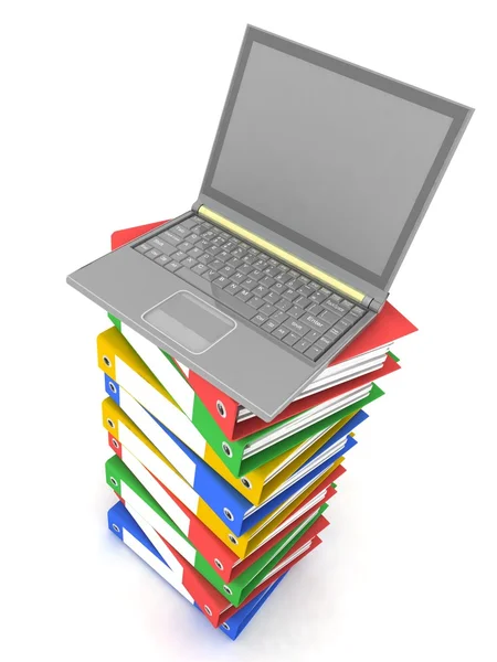 Laptop op stack van mappen — Stockfoto