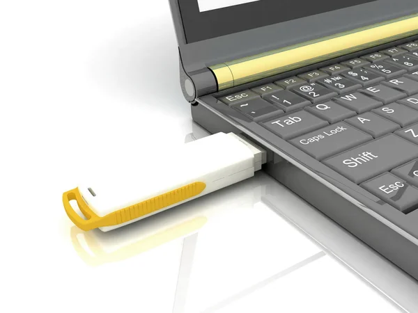 USB-Speicherlaufwerk und Laptop isoliert auf weiß — Stockfoto