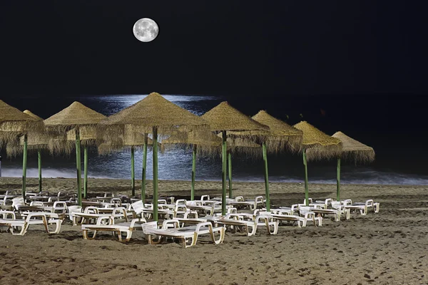 Hammocks at night in a beach — Stock Photo, Image