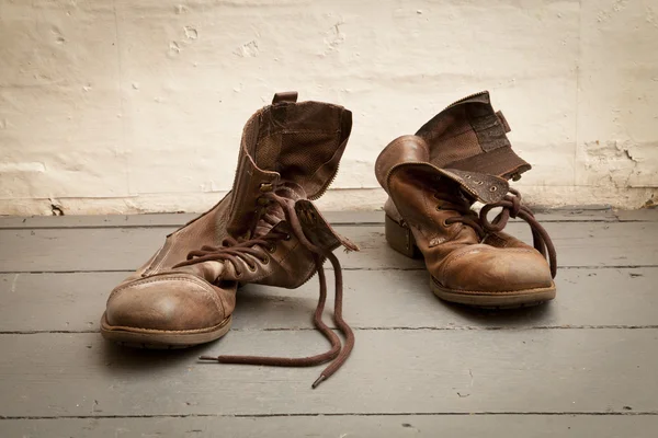Κουρασμένος παλιό μπότες Εικόνα Αρχείου