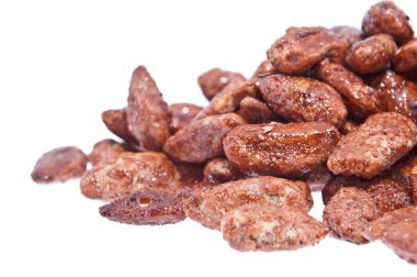 Heap of roasted almonds (with clipping path) clipart