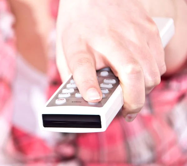 stock image Using a remote control