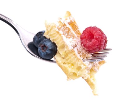 Waffle with berries on a fork (clipping paths) clipart