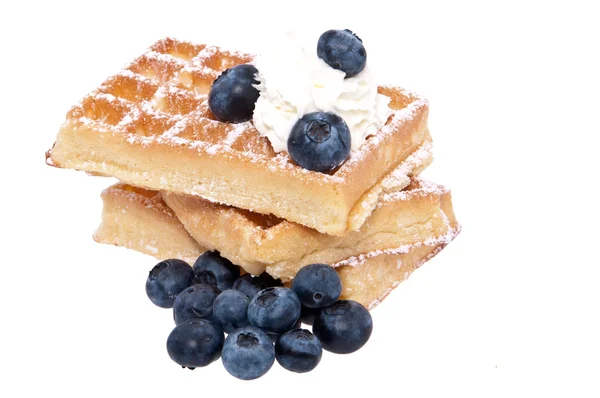 Heap of waffles with fruits and cream — Stock Photo, Image