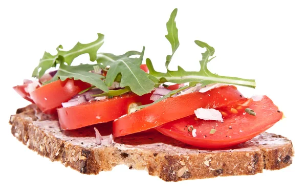 Pane vegetariano di pomodoro isolato su bianco — Foto Stock