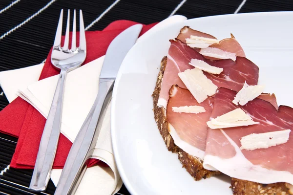 stock image Bread with gammon on a plate